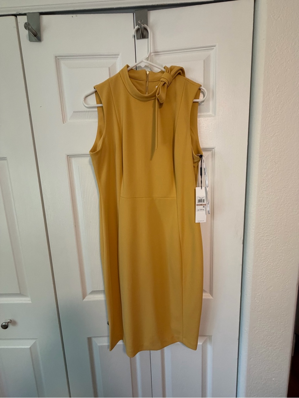 Calvin Klein Sleeveless Bow-Neck Midi Dress in Mustard